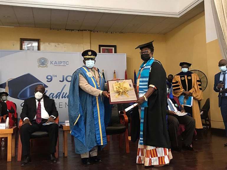 Magdalene Mary Awinyeliya Kannae receiving her award