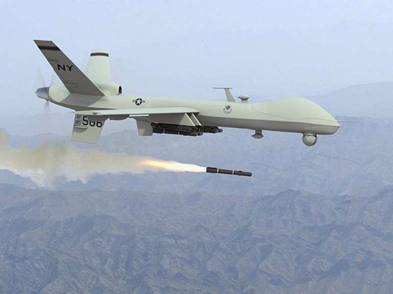 Unmanned Predator Drone firing missile
