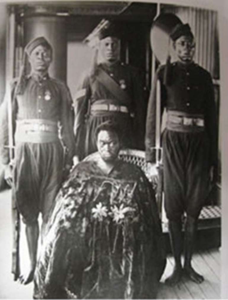 Oba Ovonramwen, from whose palace the British looted the Benin Bronzes in 1897, with foot chains, guarded by soldiers on board a British ship to exile.