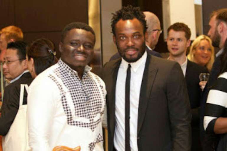 Nino with midfielder Michael Essien at his charity event*