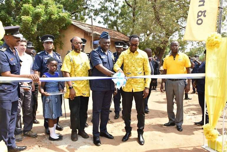 24201982019 h40o2s6eey mtn ghana ceo mr selorm adadevoh and the inspector general of police mr david asanteapeatu cut the sod for construction work to begin