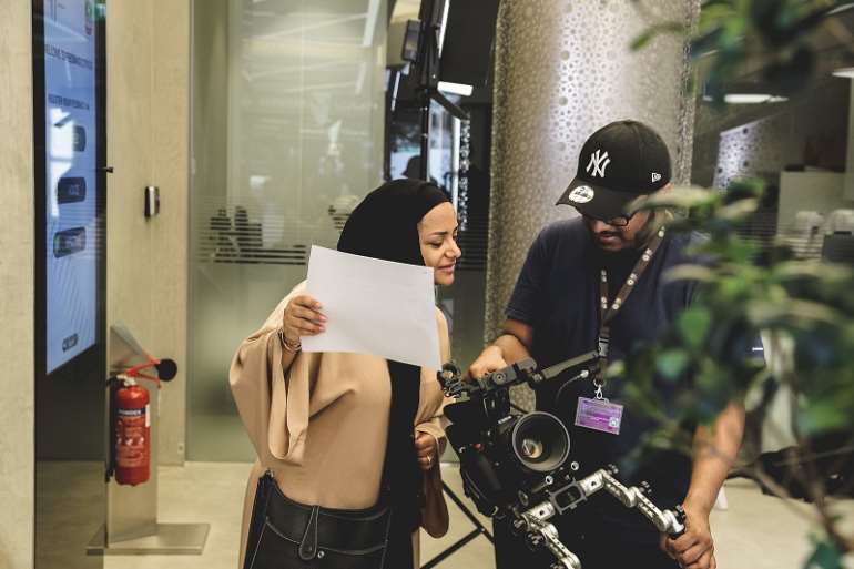 910201990314-1i830o4bbv-nayla-on-the-set-of-a-tv-commercial