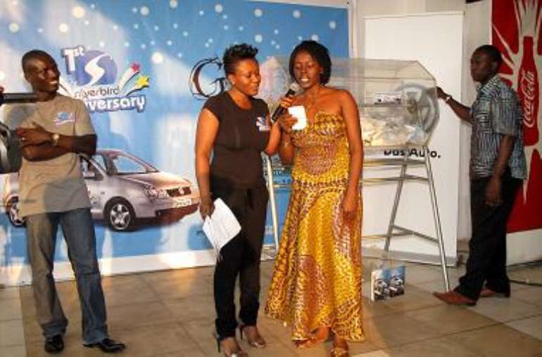 a guest reads out the name of a lucky winner