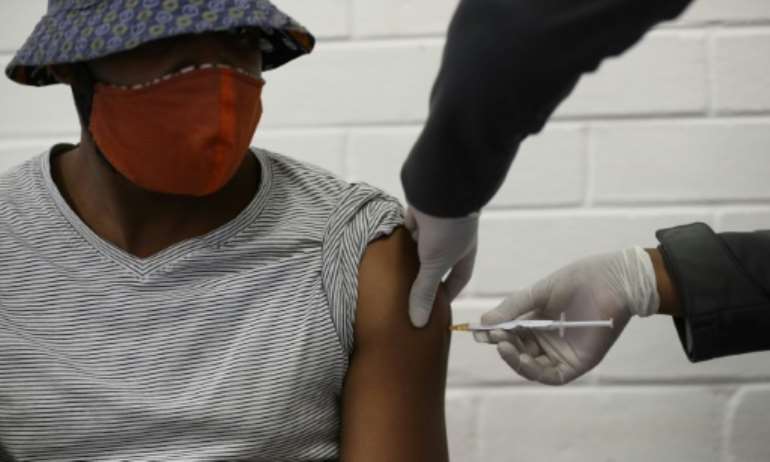 Jab: A volunteer takes part in coronavirus vaccine trial in Soweto, South Africa, in January.  By SIPHIWE SIBEKO (POOL/AFP/File)