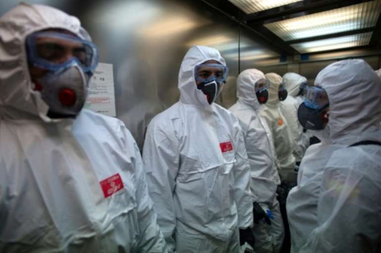 Spain recorded another 832 coronavirus deaths on Saturday, following the patten of hardest-hit Italy as the epidemic surges through Europe.  By Josep LAGO (AFP)