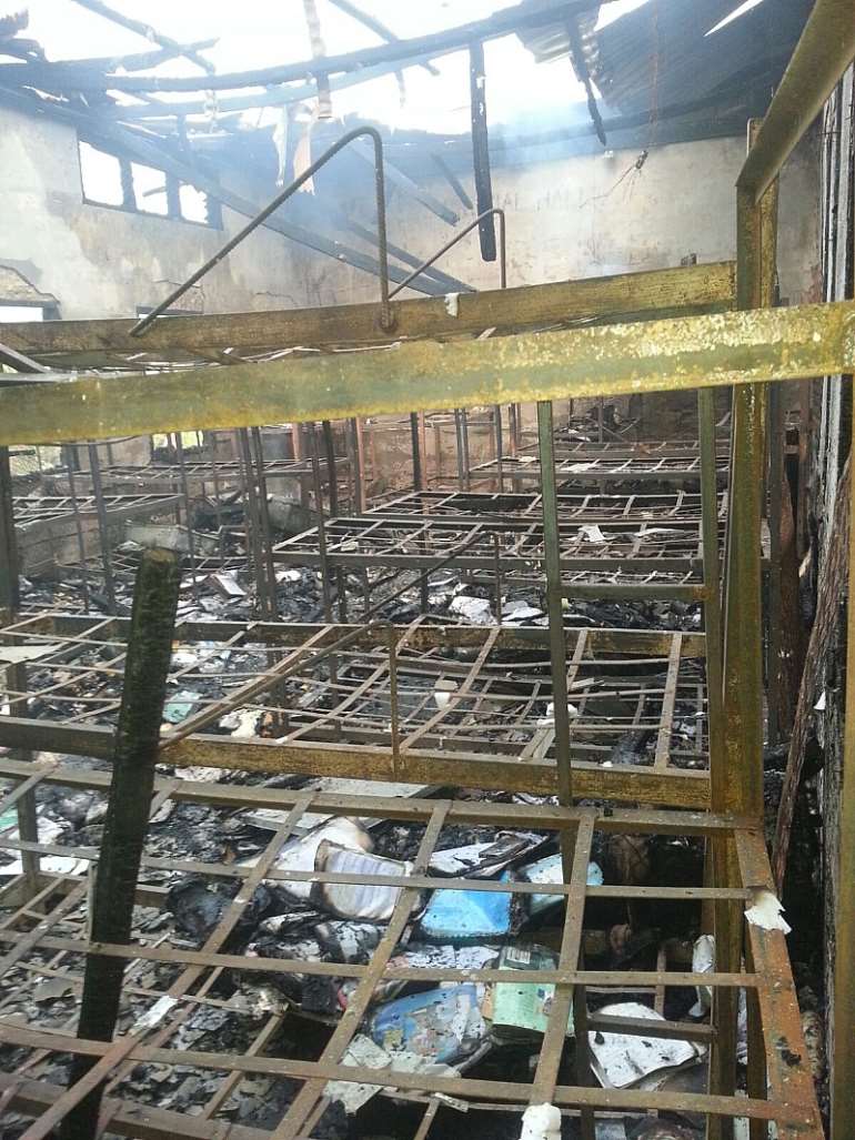 Burnt metal beds of the students inside the dormitory
