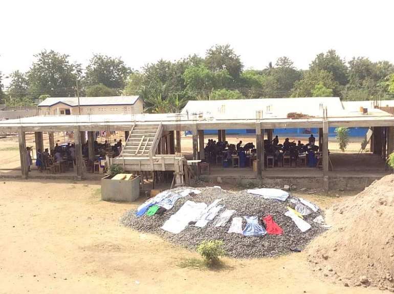 mawukogirlsstudentsstudyinginuncompletedstructure.jpeg