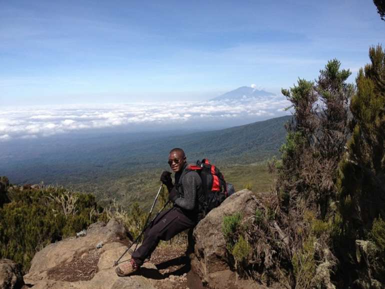 Chasant Muntaka celebrates his progress on the Kilimanjaro