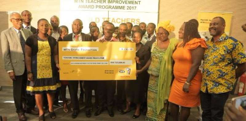 106201875703 wbreuigtto beneficiaries of mtn teacher improvement award in a group picture after scholarship presentation ceremony in 2017
