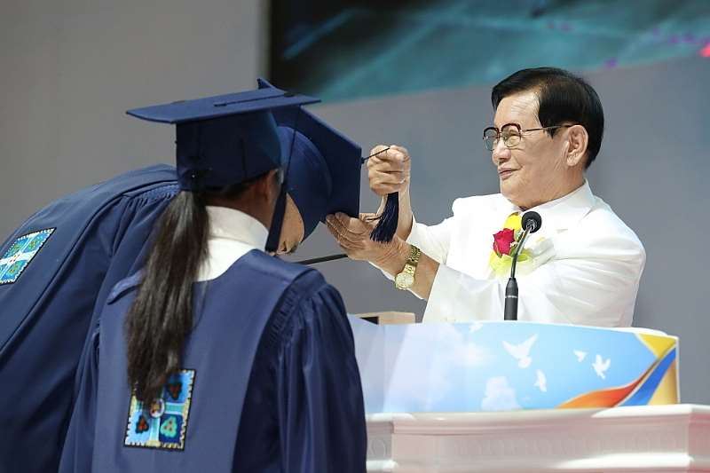 Mr. Man Hee Lee, Chairman Of Shincheonji Church Of Jesus, Is Crossing The Graduation Cap Tassels Of Graduates