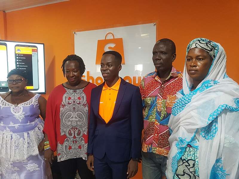 CEO of Shopnaw, Benjamin Osei Asante (middle) and some market union executives in the Greater Accra Region