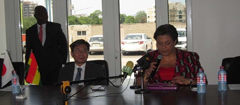 Japanese Ambassador Naoto Nikai and Ghanas Minister for Foreign Affairs, Hon. Hanna Tetteh signing the grant agreement
