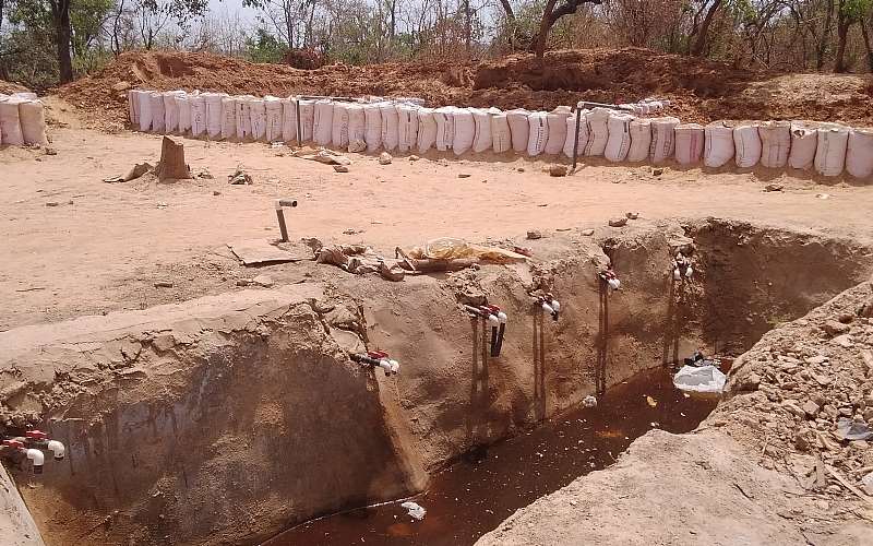 Galamsey Mercury-cyanide Dug Pit With Chemials Washed Into The Pit