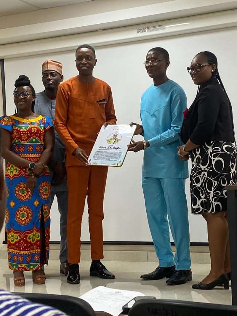 3252025105908-sxoaredq5l-youth-impact-parliament-presenting-a-citation-of-honour-for-the-right-honourable-speaker-of-parliament-alban-balgbin