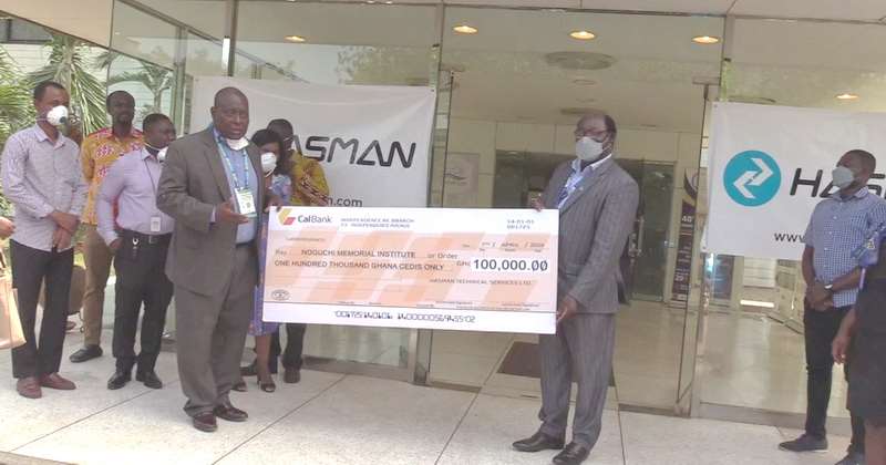 49202012508-1h830n4ayu-from-left-mr-william-andoh-wood-md-hasman-technical-services-presenting-the-cheque-to-professor-annan-director-noguchi-memorial-institute-3