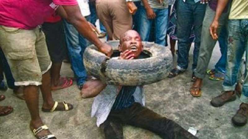 4. A MOB SETTING A YOUNG MAN ON FIRE FOR ALLEGEDLY STEALING A WALLET