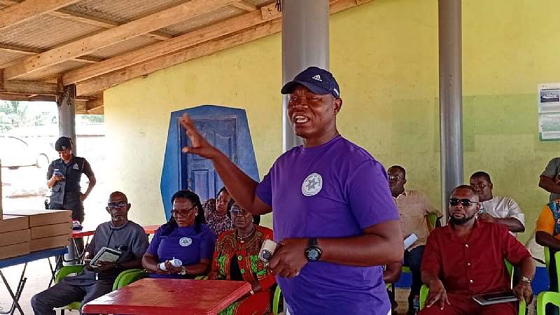 Robert Tornu, Policy Advisor for Friends of Adaklu, addressing beneficiaries and community members at the launch of The Sea Works At Night Project.