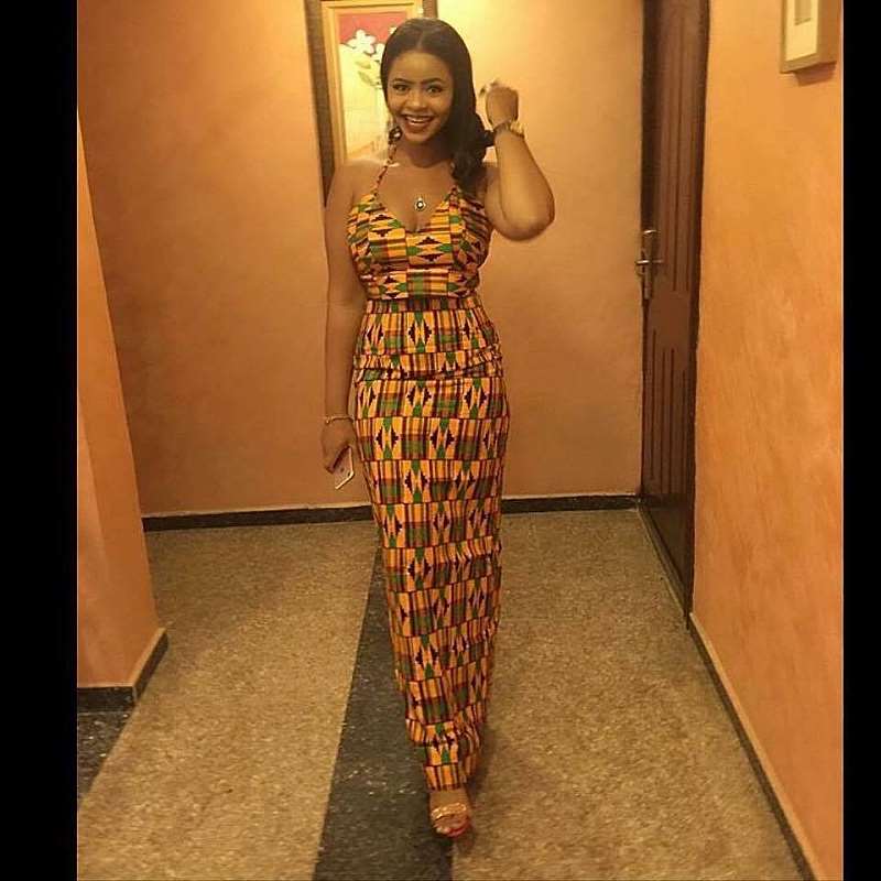 Africa lady wearing kente