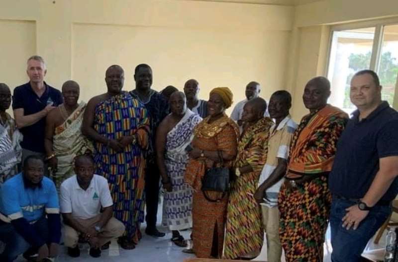 Mr Len Kolff, Left, With In Country Manager, Abdul Razak, In White, Mr Muller, Far Right, Meet With Traditional Leaders.