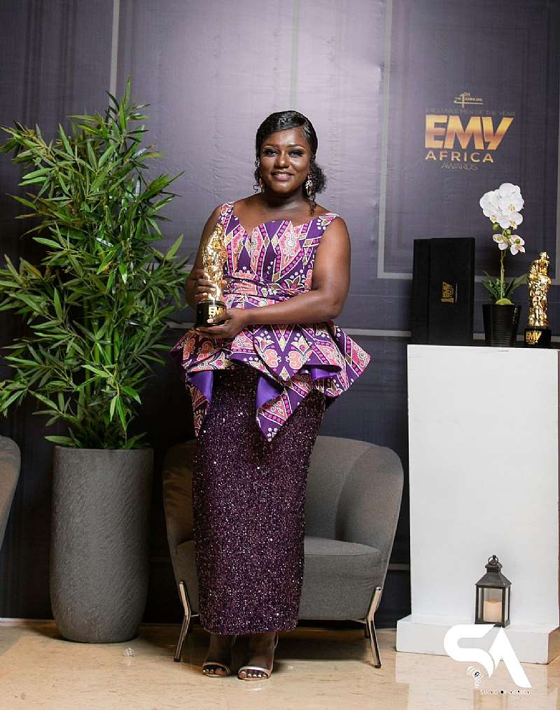Dentaa Amoateng Mbe Displays Her Award.jpeg