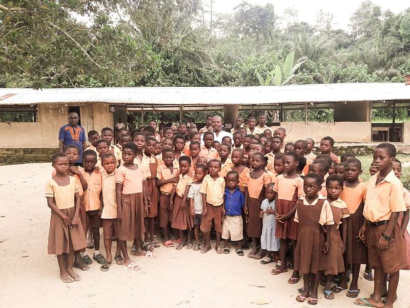 Dr. Matthew Ayeh With School Pupils