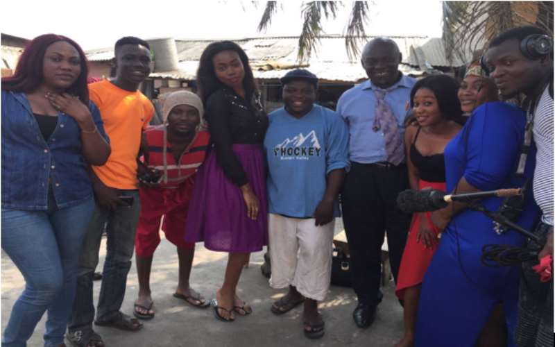 Stephanie Karikari with the crew of James Town Fisherman TV Series
