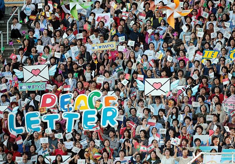 Citizens Supporting The Dpcw At The Stadium Where The Outdoor Event Took Place