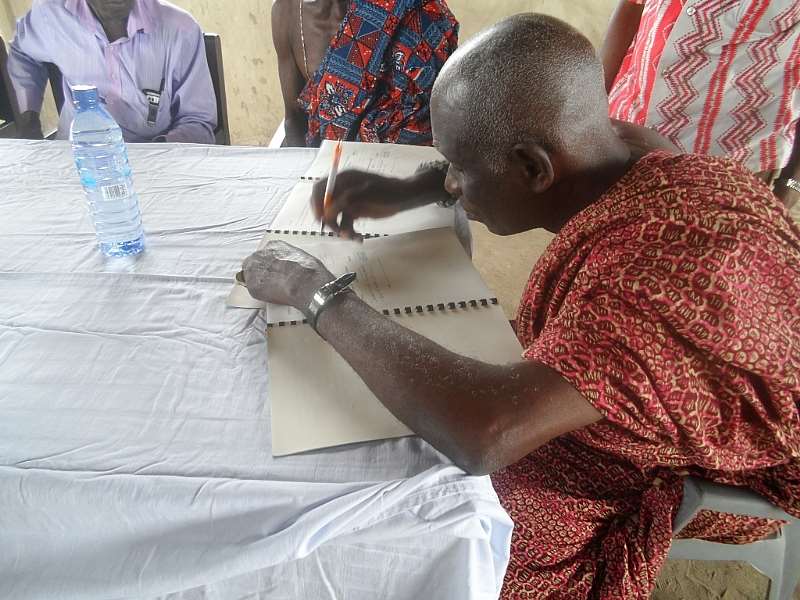 A REP OF THE TRADITIONAL LEADERS SIGNING  THEIR  PART