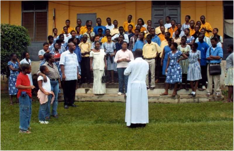 Msgr. Benson Speaking To Students On HIV /AIDS