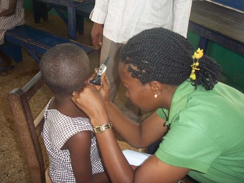 Specialists Washing Pupils Ears