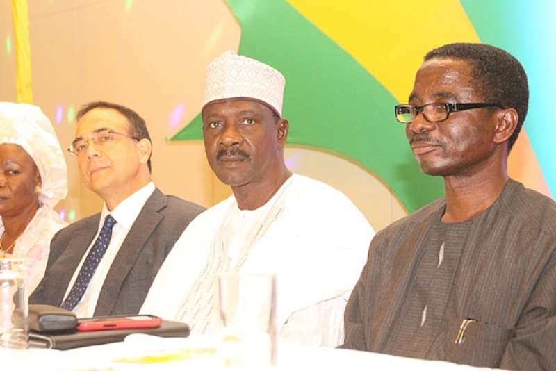 R-L: Group Managing Director, Flour Mills Nigeria Plc, Mr. Paul Gbededo; a key distributor, Alhaji Salisu Sambajo (MFR) and the Vice- Chairman, Flour Mills Nigeria Plc, Mr. John Coumantaros, during the unveiling of Golden Penny Sugar Variant  at the customers forum held in Lagos