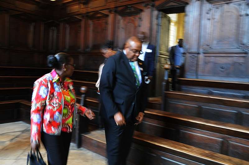 DSC 0452. MRS. MATILDA  AMISSAH-ARTHUR AND THE GHANA HIGH COMMISSIONER TO THE UK MR. VICTOR SMITH  WALK INTO THE BODLEIAN LIBRARY.