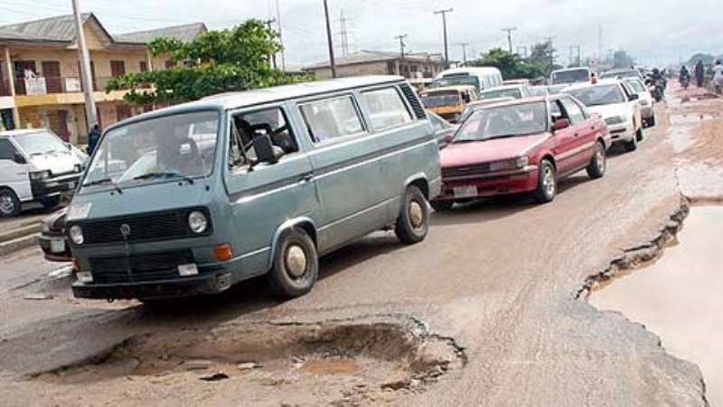 A big Crater at Barracks Busstop along Badagry express road a major cause of Traffic. Photo:Nwankpa Chijioke