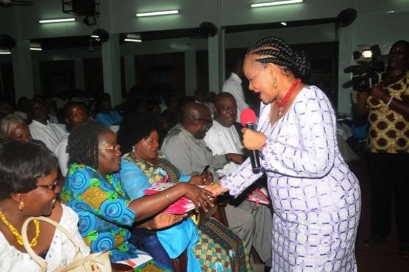 DSC 8706. MRS.MATILDA AMISSAH-ARTHUR BUYING SOME THE BOOKS THAT WAS LAUNCHED.