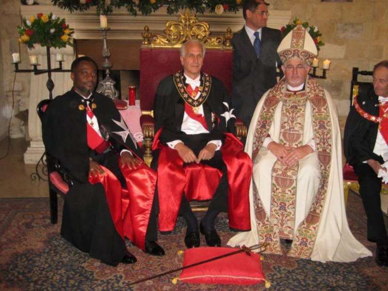 (L-R), His Majesty King Adamtey I of Ghana; His Supreme Highness Baron Nicholas Papanicoalou; and Bishop Timothy Holley, members of the Ecumenical Order of St. John of Jerusalem, Knights of Malta.
