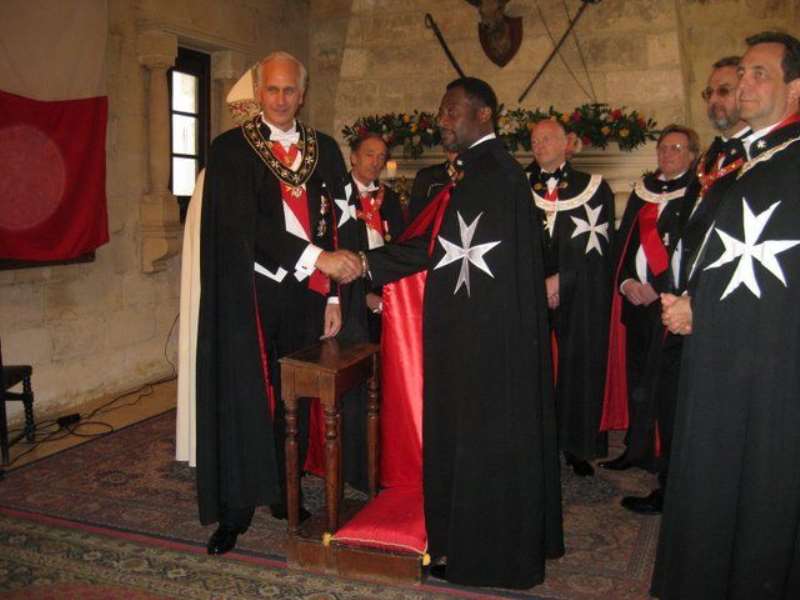 His Royal Majesty being invested into the Knights of Malta