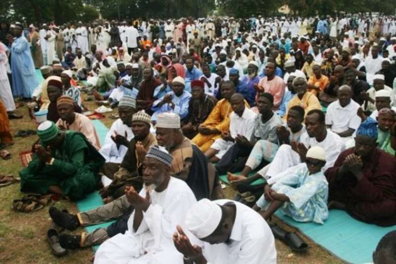 MEMBERS OF THE ALHUSSUNNAWAL JAMA ,PRAYING AT THE CHILDREN S PARK .