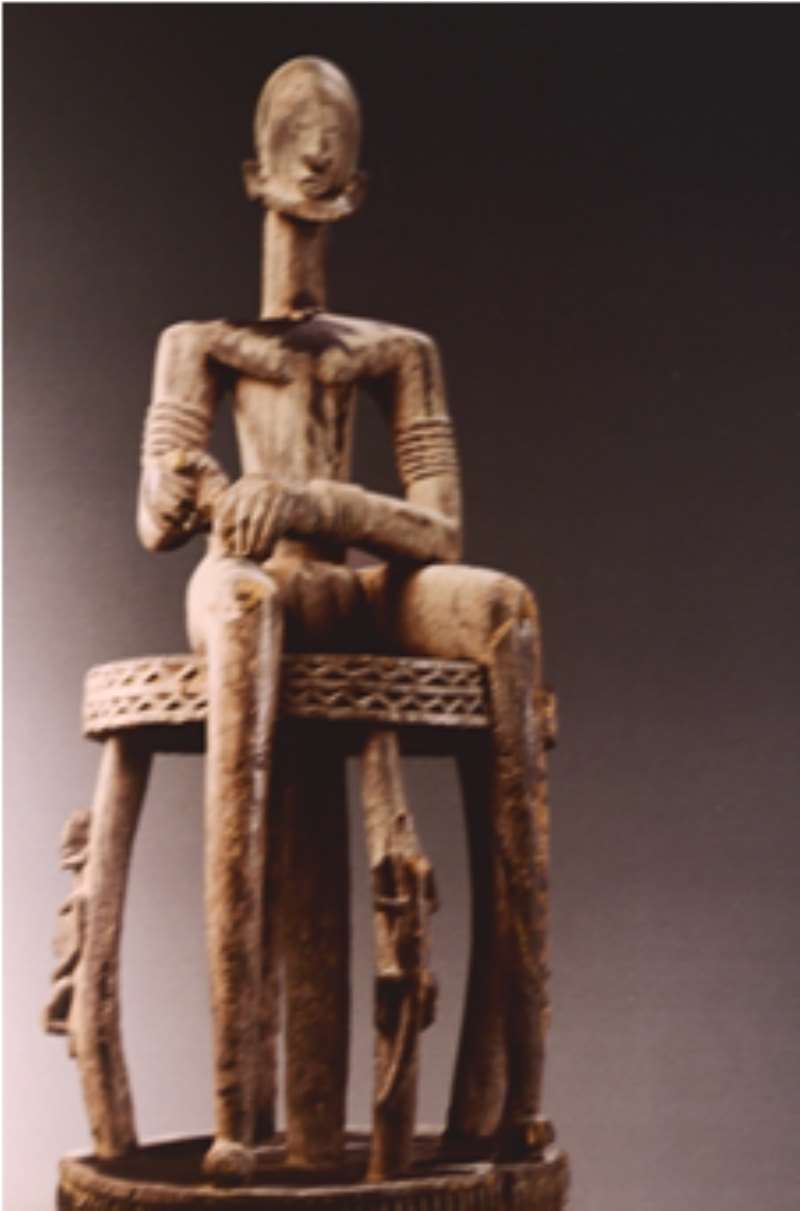 MASCULINE FIGURE, SEATED ON A STOOL, TINTAM, MALI, NOW IN MUSE DES BEAUX-ARTS, MONTREAL, CANADA