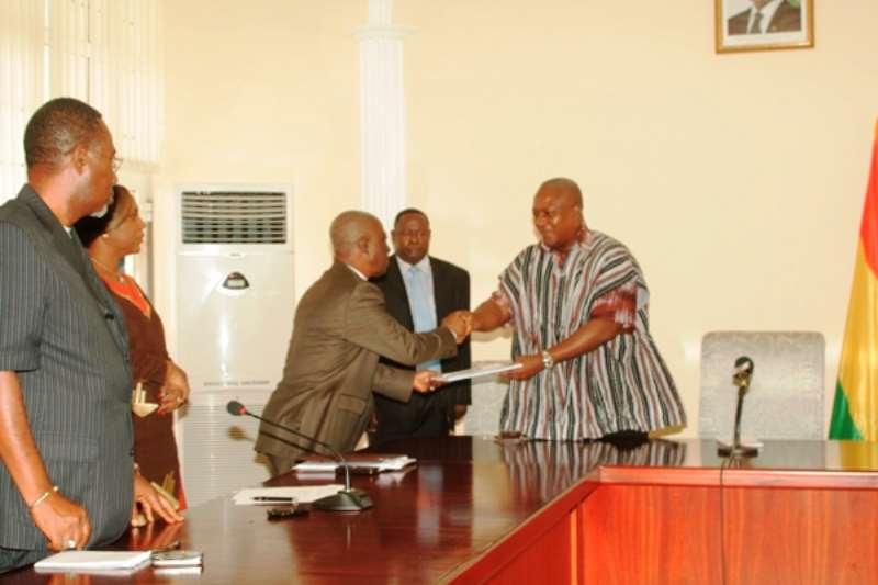 MR TWUM PRESENTING REPORT ON FIRE OUTBREAK THAT GUTTERED MINISTRY OF FROEIGN AFFAIRS BUILDING TO VICE PRESIDENT MAHAMA