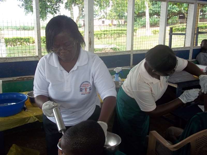 Specialists Washing Pupils Ears