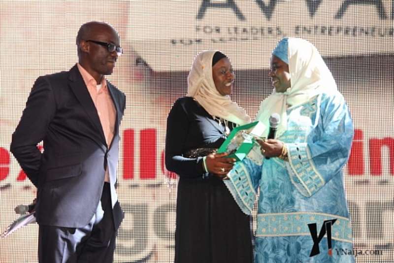 MRS JUMMAI AJILOLA AND LATE MR EFERE OZAKO PRESENTING AN  AWARD AT THE FUTURE AWARDS 2012