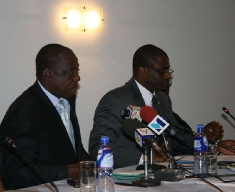 Dr Benjamin Kumbuor, (left) a Deputy Minister of Health speakingat the Global Business Coalition Fund workshop in Accra. With him is MrLe`opold Zekeng, (right) UNAIDS Country Coordinator in Ghana.