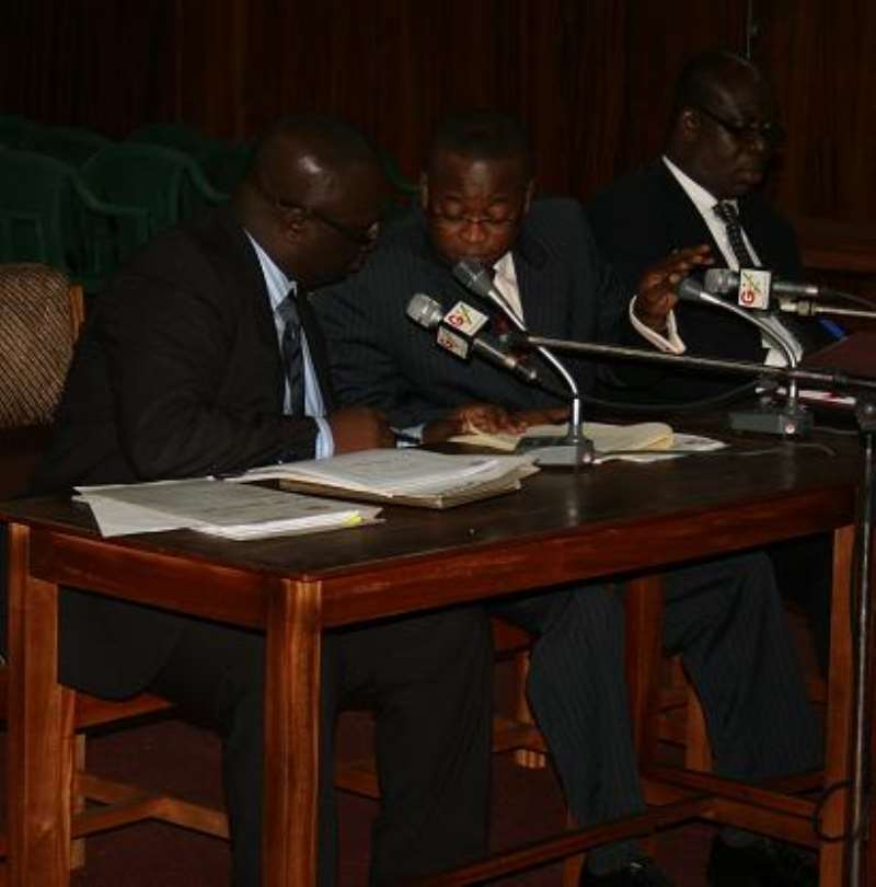 Mr Michael Adotey Addo (left), General Manager in charge of  Investment at SSNIT, and Mr Ernest Thompson, Counsel for SSNIT (right)