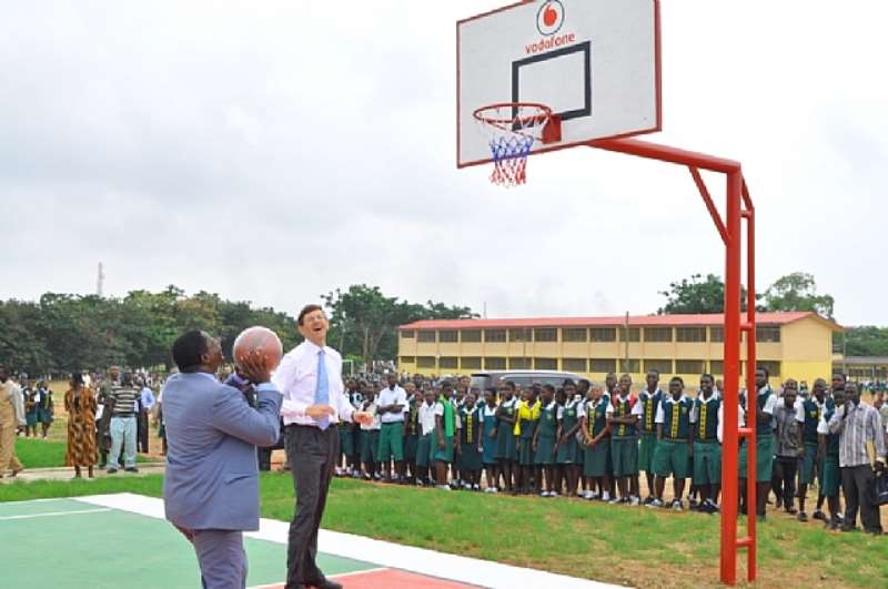 PICTURE OF HON. NII ARMAH ASHITEY, GREATER-ACCRA REGIONAL MINISTER AND VITTORIO COLAO, GROUP HEAD OF VODAFONE AT THE SPORTS FACILITY AT THE SCHOOL