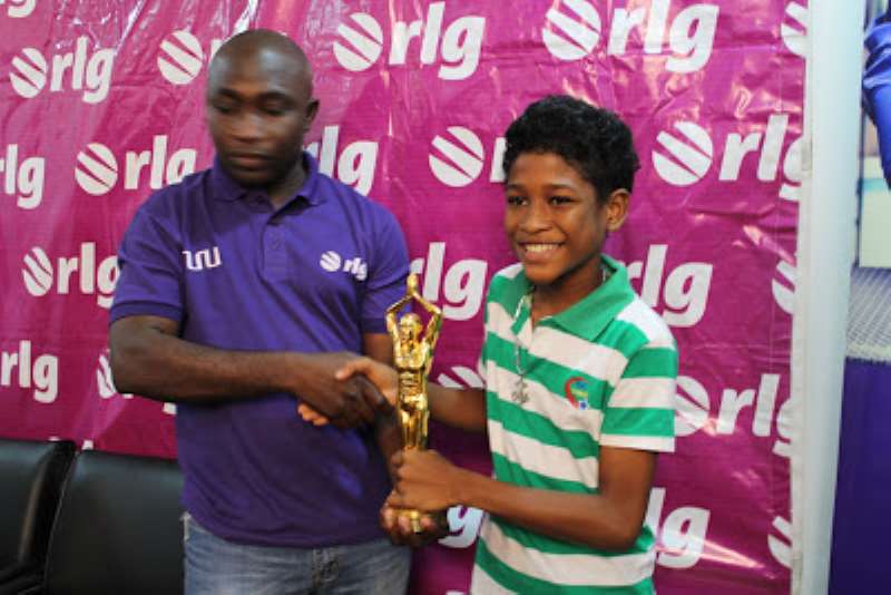 RAHIM BANDA RECEIVES HIS TROPHY