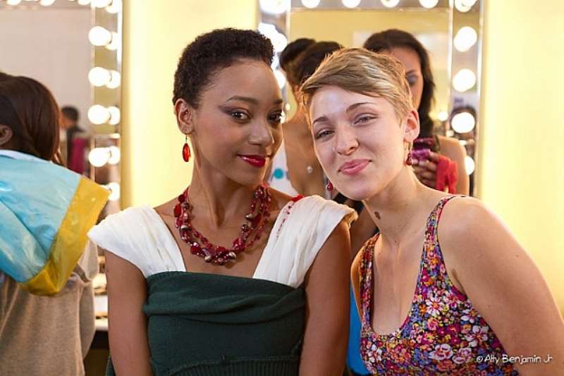 REBECCA POSES IN THE SINGER SEWING ROOM WITH MODEL ABENAH GONZALEZ-ALTY BENJAMIN JR.