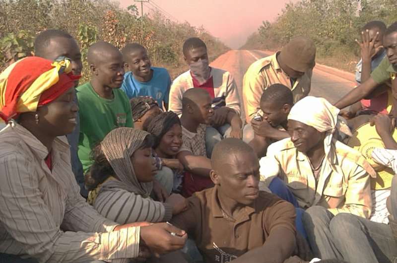 SOME PERSONNEL AND VOLUNTEERS BEING TRANSPORTED TO THE FARM