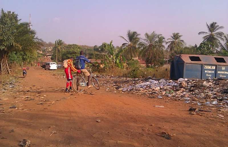 SOME PUPILS CAUGHT BY OUR CAMERA NEAR THE REFUSE DUMP