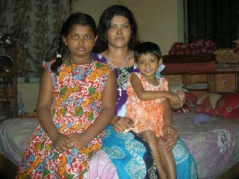Surviving members of Joacem Costas family, wife Laili Costa and two daughters. (PhotoDipal Barua)