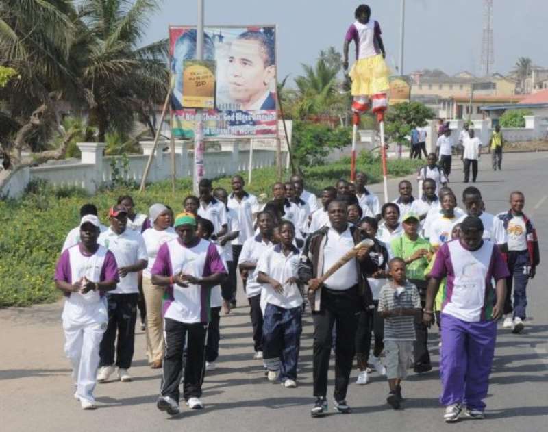 Cape Coast community Batonbearers carry the Queens Baton 2010 Delhi from Emintsimadze Palace to Cape Coast Castle in Ghana on 17 December 2009.